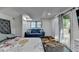 Comfortable bedroom with sliding door to the outdoor deck at 1358 Millstream Trl, Lawrenceville, GA 30044