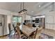 Elegant dining room adjacent to the modern kitchen, with deck access at 1358 Millstream Trl, Lawrenceville, GA 30044