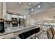 Modern kitchen boasts granite counters, stainless appliances, and a breakfast bar at 1358 Millstream Trl, Lawrenceville, GA 30044