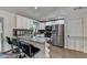 Modern kitchen boasts stainless steel appliances, granite countertops, and ample cabinet space at 1358 Millstream Trl, Lawrenceville, GA 30044