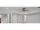 Finished basement area features a ceiling fan, recessed lighting, stairs, and neutral decor at 2592 River Oak Dr, Decatur, GA 30033