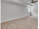 Basement area featuring hardwood floors, a bright window providing natural light, and neutral décor at 2592 River Oak Dr, Decatur, GA 30033
