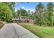 Traditional brick home with well-manicured lawn and a charming front entryway at 2592 River Oak Dr, Decatur, GA 30033