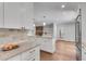 Beautiful kitchen area that features white cabinetry, an island, and hardwood flooring at 2592 River Oak Dr, Decatur, GA 30033