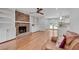 Bright and spacious living area with hardwood floors, fireplace, and direct view of the kitchen at 2592 River Oak Dr, Decatur, GA 30033