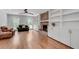Cozy living room with hardwood floors, fireplace, built-in shelving, and abundant natural light at 2592 River Oak Dr, Decatur, GA 30033