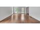 Spacious living room showcasing hardwood floors, white walls, and recessed lighting at 2592 River Oak Dr, Decatur, GA 30033