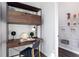 Convenient home office space with built in desk and shelving with walk in pantry access at 417 Newland Way, Acworth, GA 30102