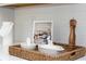 Close up of kitchen decor with a cookbook and small serving dishes on white counters and white backsplash at 417 Newland Way, Acworth, GA 30102