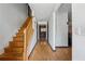 Hallway features hardwood flooring and wooden stairs at 475 Shadetree Ln, Lawrenceville, GA 30044