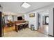 This eat-in kitchen features views of the dining and living rooms at 475 Shadetree Ln, Lawrenceville, GA 30044