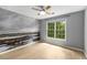 Bedroom with hardwood floors, ceiling fan, and lots of natural light at 600 Oakmont Hl, Duluth, GA 30097
