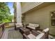 Cozy outdoor deck featuring comfortable seating arrangements and a tranquil view at 600 Oakmont Hl, Duluth, GA 30097