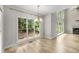 Bright dining area with hardwood floors, large windows, and elegant chandelier at 600 Oakmont Hl, Duluth, GA 30097