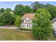 Charming two-story home featuring a well-manicured front yard and a classic design with beautiful landscaping at 600 Oakmont Hl, Duluth, GA 30097