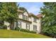 Charming two-story home featuring a well-manicured front yard and a classic design with beautiful landscaping at 600 Oakmont Hl, Duluth, GA 30097