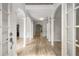 Spacious foyer with beautiful hardwood floors, white columns, arched doorways and plenty of natural light at 600 Oakmont Hl, Duluth, GA 30097