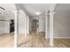 Spacious foyer with beautiful hardwood floors, white columns, arched doorways and plenty of natural light at 600 Oakmont Hl, Duluth, GA 30097