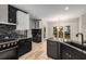 Modern kitchen with stainless appliances, granite countertops, wood floors and plenty of storage at 600 Oakmont Hl, Duluth, GA 30097