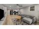 Inviting living area with an open floor plan, modern decor, and a large comfortable sofa at 600 Oakmont Hl, Duluth, GA 30097