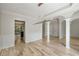Spacious living room with hardwood floors, white trim, and open access to the kitchen at 600 Oakmont Hl, Duluth, GA 30097