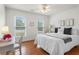 Cozy bedroom with bright window light and desk at 739 Dushea Nw Ct, Kennesaw, GA 30144