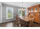 Dining area featuring beautiful wooden furniture, lots of natural light and hardwood floors at 739 Dushea Nw Ct, Kennesaw, GA 30144