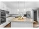 Bright kitchen featuring white cabinets, granite countertops, stainless steel appliances at 739 Dushea Nw Ct, Kennesaw, GA 30144