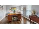 Home office featuring a classic wooden desk, traditional decor, and ample natural light at 739 Dushea Nw Ct, Kennesaw, GA 30144