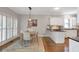 Eat-in kitchen features natural light, stainless appliances, and sleek countertops for modern appeal at 1064 Saint James Xing, Brookhaven, GA 30319