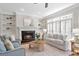 Bright living room with fireplace, built-in shelves, and plush seating for a cozy atmosphere at 1064 Saint James Xing, Brookhaven, GA 30319