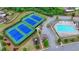 Aerial view showcasing tennis courts and a pool within the community at 1200 Bar Harbor Pl, Lawrenceville, GA 30044