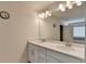 Elegant bathroom with a double vanity, quartz countertop, and bright lighting for a refreshing experience at 1200 Bar Harbor Pl, Lawrenceville, GA 30044