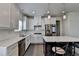 Bright kitchen featuring subway tile backsplash and stainless steel appliances at 1200 Bar Harbor Pl, Lawrenceville, GA 30044