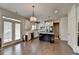 Open kitchen with an island and stainless steel appliances at 1200 Bar Harbor Pl, Lawrenceville, GA 30044