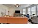 Cozy living room with ample seating, hardwood floors, and a ceiling fan at 1200 Bar Harbor Pl, Lawrenceville, GA 30044