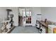 Comfortable living room with lots of cat furniture and a doorway to another room at 1200 Bar Harbor Pl, Lawrenceville, GA 30044