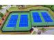 Aerial shot of the community tennis courts showing well-maintained courts and surrounding landscape at 1200 Bar Harbor Pl, Lawrenceville, GA 30044