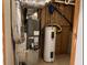 Utility room with water heater and air conditioning unit at 279 Fairview Dr, Dallas, GA 30157