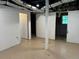 Spacious basement with exposed ductwork and access to additional rooms at 279 Fairview Dr, Dallas, GA 30157