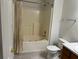 Bathroom featuring a jacuzzi tub, toilet, and vanity at 279 Fairview Dr, Dallas, GA 30157