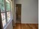 View from bedroom to the en-suite bathroom with tub/shower combo at 279 Fairview Dr, Dallas, GA 30157