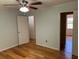 A bedroom featuring hardwood floors and a ceiling fan at 279 Fairview Dr, Dallas, GA 30157