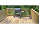 Outdoor wooden deck featuring a grill, perfect for entertaining with a nice view at 279 Fairview Dr, Dallas, GA 30157