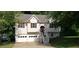 Charming two-story home with a well-maintained front yard and a two-car garage at 279 Fairview Dr, Dallas, GA 30157