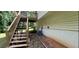 Exterior staircase and elevated deck providing access to the backyard at 279 Fairview Dr, Dallas, GA 30157