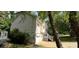 View of a home featuring a two car garage, side stairs, and vinyl siding at 279 Fairview Dr, Dallas, GA 30157