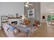 Bright living room boasts a modern fireplace, stylish decor, and comfortable seating arrangements at 4053 Five Oaks Ct, Powder Springs, GA 30127