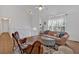 Cozy living room with vaulted ceiling, stylish leather chairs, and plush sofa at 4053 Five Oaks Ct, Powder Springs, GA 30127
