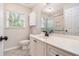 Bathroom featuring a large vanity, tile floors and enclosed glass shower at 703 Kirkwood Cir, Woodstock, GA 30189